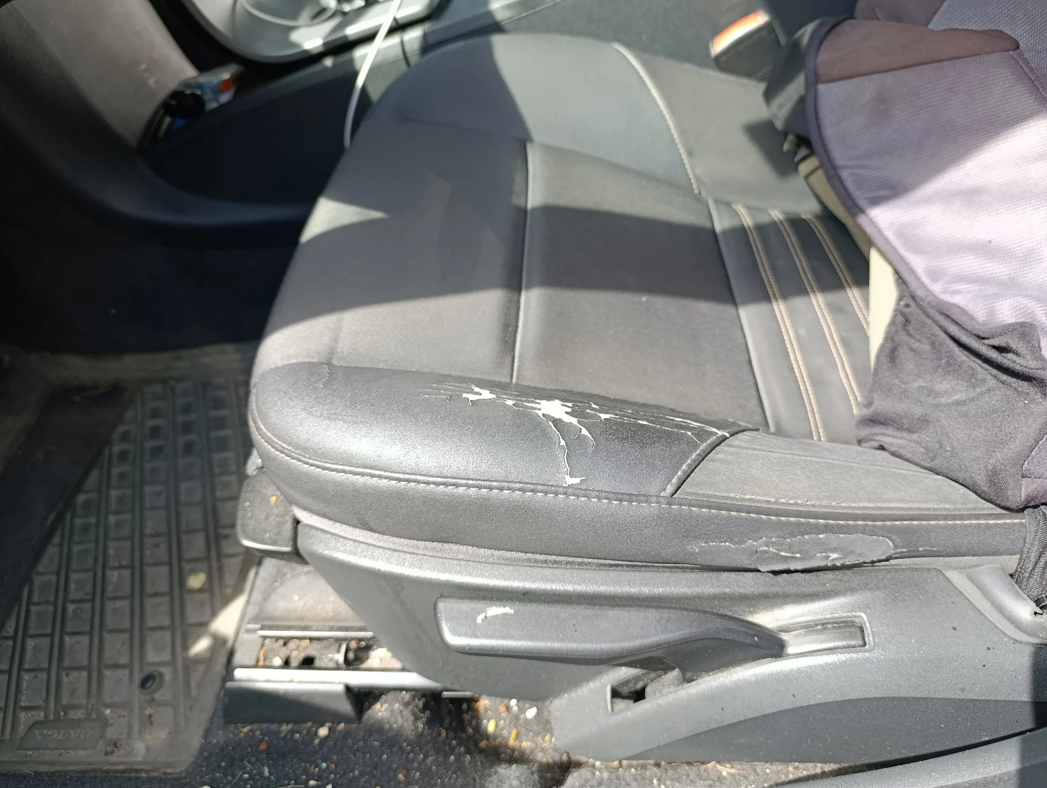 Damaged car seat before restoration